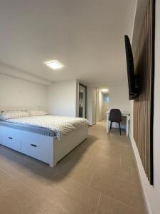 Ένα ή περισσότερα κρεβάτια σε δωμάτιο στο Laibach Suite