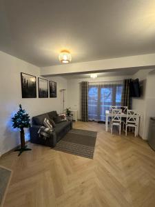 Posedenie v ubytovaní Apartament Skandynawska Prostota z basenem i sauną