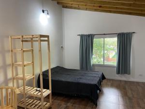 Ένα ή περισσότερα κρεβάτια σε δωμάτιο στο Panchito