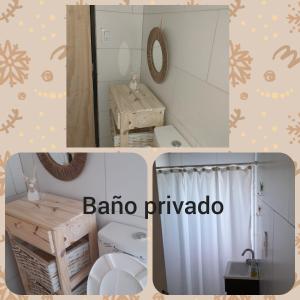 a bathroom with a toilet and a sink and a mirror at Casa la buena vida in San Rafael