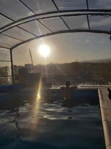 Bình minh/hoàng hôn nhìn từ nhà nghỉ dưỡng  hoặc gần đó