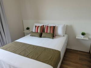 Cama o camas de una habitación en Sobrado com garagem e churrasqueira