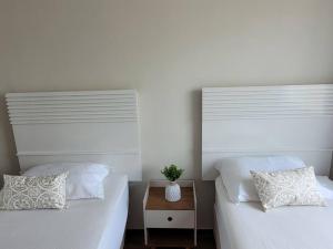 Cama o camas de una habitación en Sobrado com garagem e churrasqueira