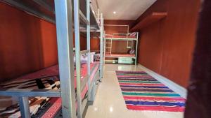 Uma ou mais camas em beliche num quarto em HostelExp, Gokarna - A Slow-Paced Backpackers Community