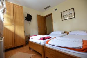 Postel nebo postele na pokoji v ubytování Motel Kneginja