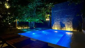 בריכת השחייה שנמצאת ב-Hotel Noga או באזור