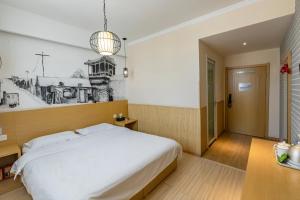 Happy Dragon Alley Hotel-In the city center close to the subway&free coffe laundry Fluent English speaking,Tourist attractions ticket service&food recommendation,Near Tian Anmen Forbiddencity,Near Lama temple,Easy access to the airport客房内的一张或多张床位