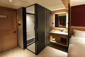 Katil atau katil-katil dalam bilik di Maison New Century Tongxiang