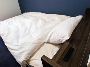 Postel nebo postele na pokoji v ubytování Shima no Hotel
