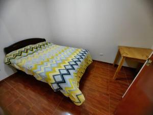 Posteľ alebo postele v izbe v ubytovaní Amplio Departamento en 2do piso
