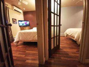 Postel nebo postele na pokoji v ubytování Hotel Alila