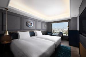 Katil atau katil-katil dalam bilik di Mercure Tokyo Haneda Airport