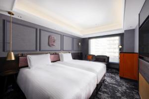 Katil atau katil-katil dalam bilik di Mercure Tokyo Haneda Airport