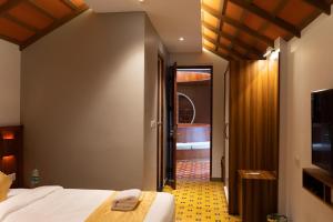 Palcastle Regency客房内的一张或多张床位