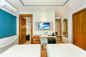 Voodi või voodid majutusasutuse Ananta Home toas