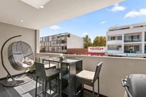 En balkon eller terrasse på Stylish Spacious Modern 1 BDR Balcony BBQ AirCon Lift