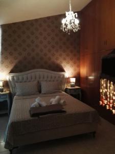 Postel nebo postele na pokoji v ubytování Dana's Luxury Maisonette