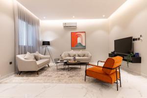 TV a/nebo společenská místnost v ubytování Amber Hospitality - Al Qairawan