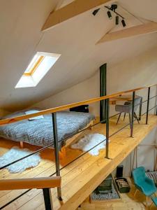 a room with two bunk beds in a loft at Siedlisko Kamionka in Kamionka +16 photos