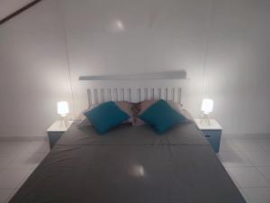 Posteľ alebo postele v izbe v ubytovaní Loue Maison entière