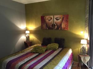 Кровать или кровати в номере Mer et Sable B&B