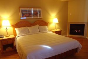 Postel nebo postele na pokoji v ubytování Hotel Alila