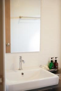 Koupelna v ubytování Prix Hotel