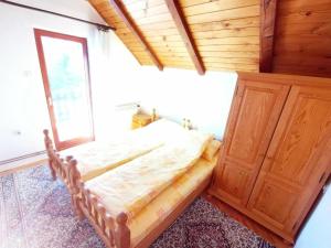 Postel nebo postele na pokoji v ubytování vila Zoran