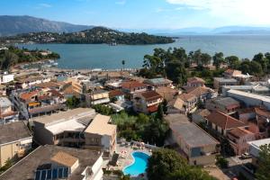 an aerial view of a town next to the water at Louvre Hotel in Gouvia