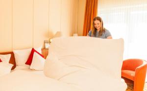 Postel nebo postele na pokoji v ubytování Hotel Friese