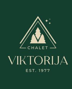 a logo for a ski resort with a mountain in a triangle at Viktorija chalet in Kopaonik