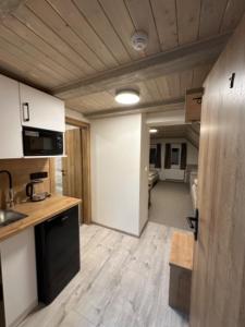 Una cocina o cocineta en Apartmány VESNA