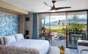 Postel nebo postele na pokoji v ubytování Boutique Oceanfront Vistas + 27 fotografií