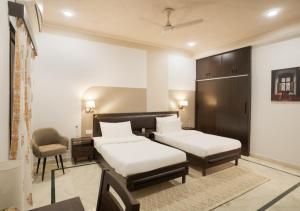 A bed or beds in a room at Firebrick Boutique Residences - GARNET HOUSE