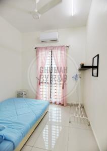 a hospital room with a bed and a window at Ghumah by R&P (near Hospital Sultanah Bahiyah) in Alor Setar
