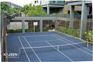 a tennis court in front of a building at Spacious 3br With Gym & Pool in Ho Chi Minh City