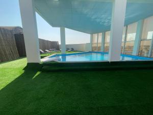 Πισίνα στο ή κοντά στο Wakra Inn Hotel Apartments