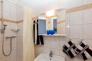 Koupelna v ubytování Hotel Kiek ut + 20 fotografií