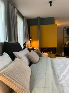 Guestsuite The Nest客房内的一张或多张床位