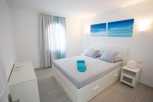 Postel nebo postele na pokoji v ubytování Apartamento SARA en el complejo Teguisol