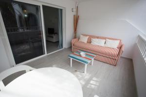 Posezení v ubytování Apartamento SARA en el complejo Teguisol
