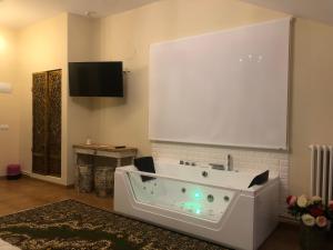 TV a/nebo společenská místnost v ubytování Hospedería Casa Martell