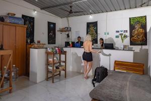 a woman standing at a counter in a room at Crystall Goa Turquoise Edition in Patnem +26 photos