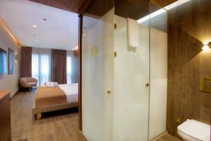 Postel nebo postele na pokoji v ubytování Kate Hotel Special Class & SPA