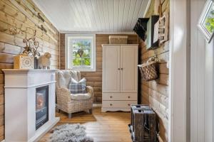 Χώρος καθιστικού στο Cozy and comfortable cabin in the center of Sjusjøen with a large terrace