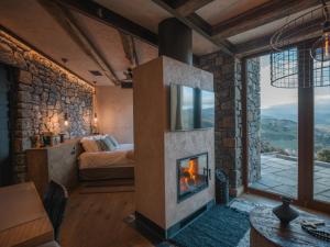 A bed or beds in a room at Chalet Azanias Kalavryta