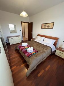 Tempat tidur dalam kamar di Cà Savoia