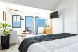 Amaze Suites客房内的一张或多张床位
