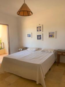 Ένα ή περισσότερα κρεβάτια σε δωμάτιο στο Casa do Português