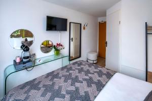 Postel nebo postele na pokoji v ubytování Jupiter Hotel
